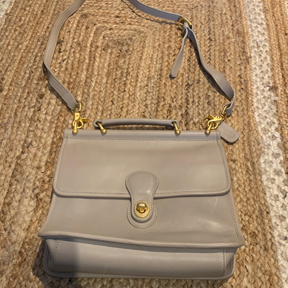 beige coach bag